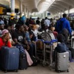 Passengers stranded with luggage at Jomo Kenyatta International Airport during Kenya airport strike