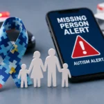 National Autism Missing and Endangered Person Alert initiative with an emergency alert phone and autism awareness ribbon