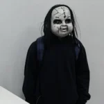 Zymire Hughes, accused of threatening Philadelphia pedestrians while wearing a Chucky-style mask, was arrested in Las Vegas.