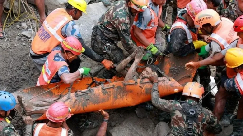 Nepal Tunnel Rescue: Two Workers Found Alive After 9 Days as Hundreds Remain Trapped 51 Rescuers carry survivor Sanjay Sah out of a hydropower tunnel in Nepal after nine days trapped underground